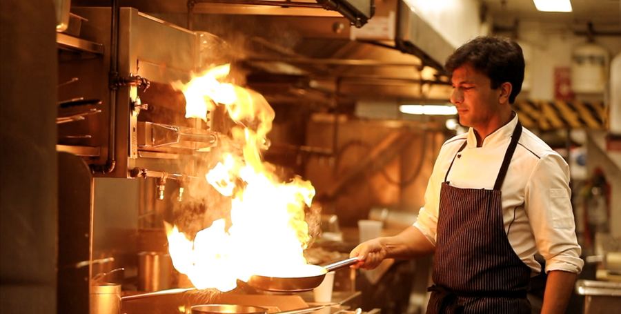 Vikas Khanna cooking over open flame